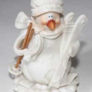 Decorative Figurine of a Cream Colored Duck Holding Skis & Poles 5 1/2" Tall